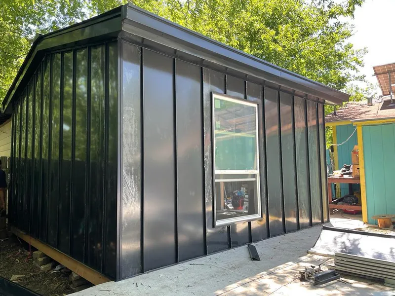 Black standing seam metal wall panels for Roof Inspection in Marco Island